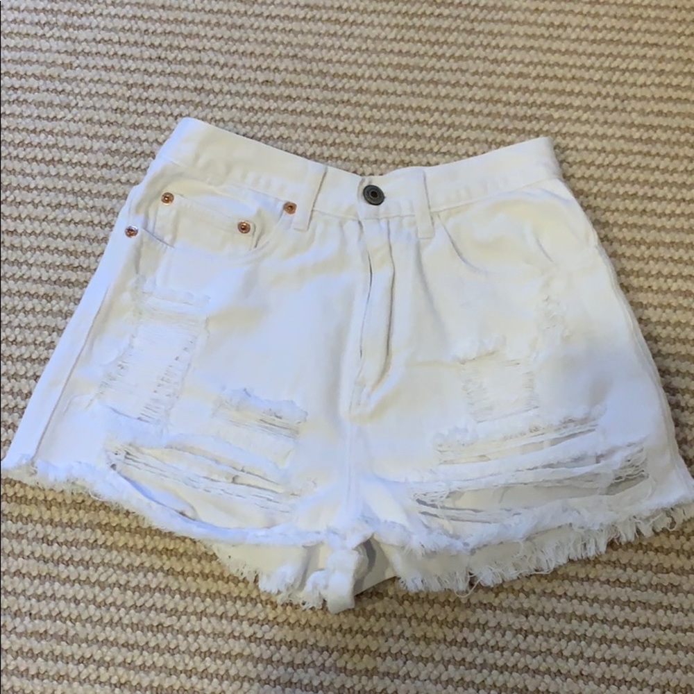 High waisted white ripped denim shorts